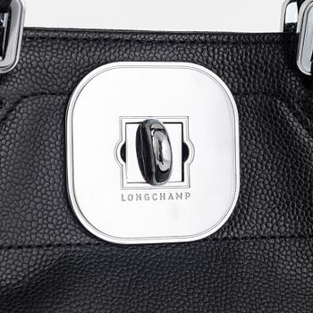 Longchamp, A black leather bag.