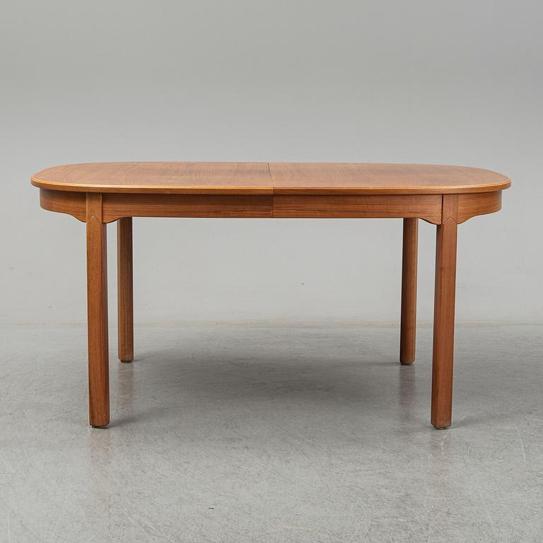 A five-piece walnut 'Ambassadör' dining suite by Carl Malmsten.