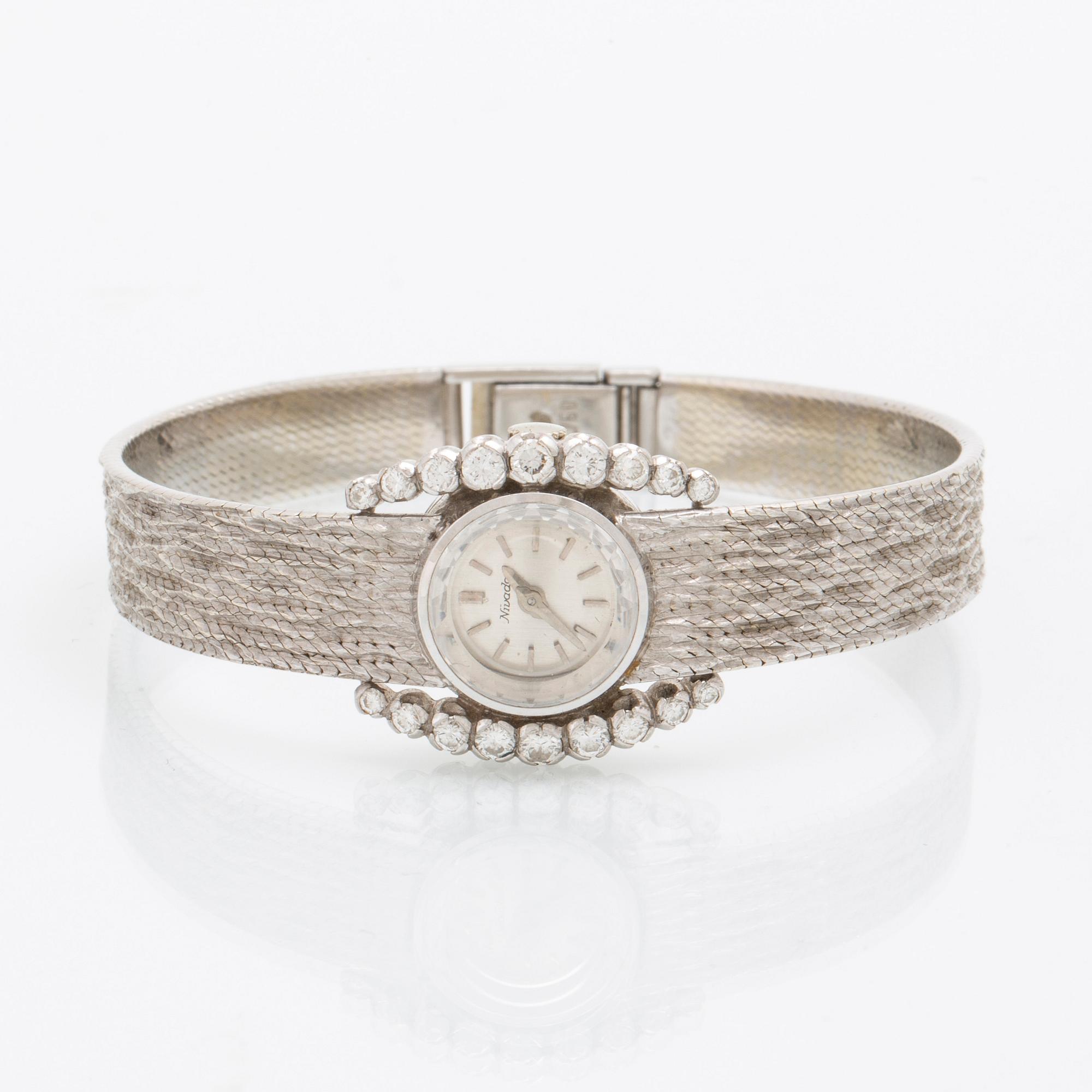 Nivada armbandsur 12,2 mm, 18K vitguld och runda briljantslipade diamanter.