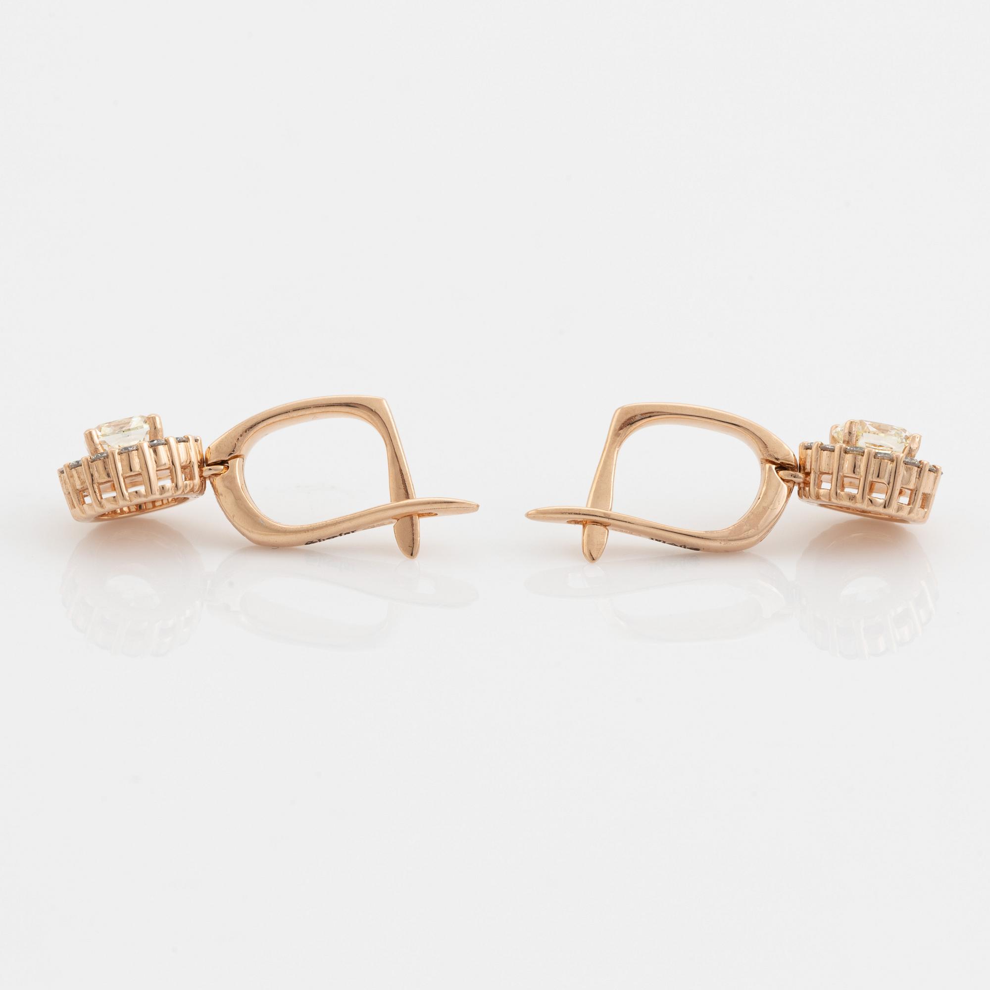 Cushion cut diamond earrings.