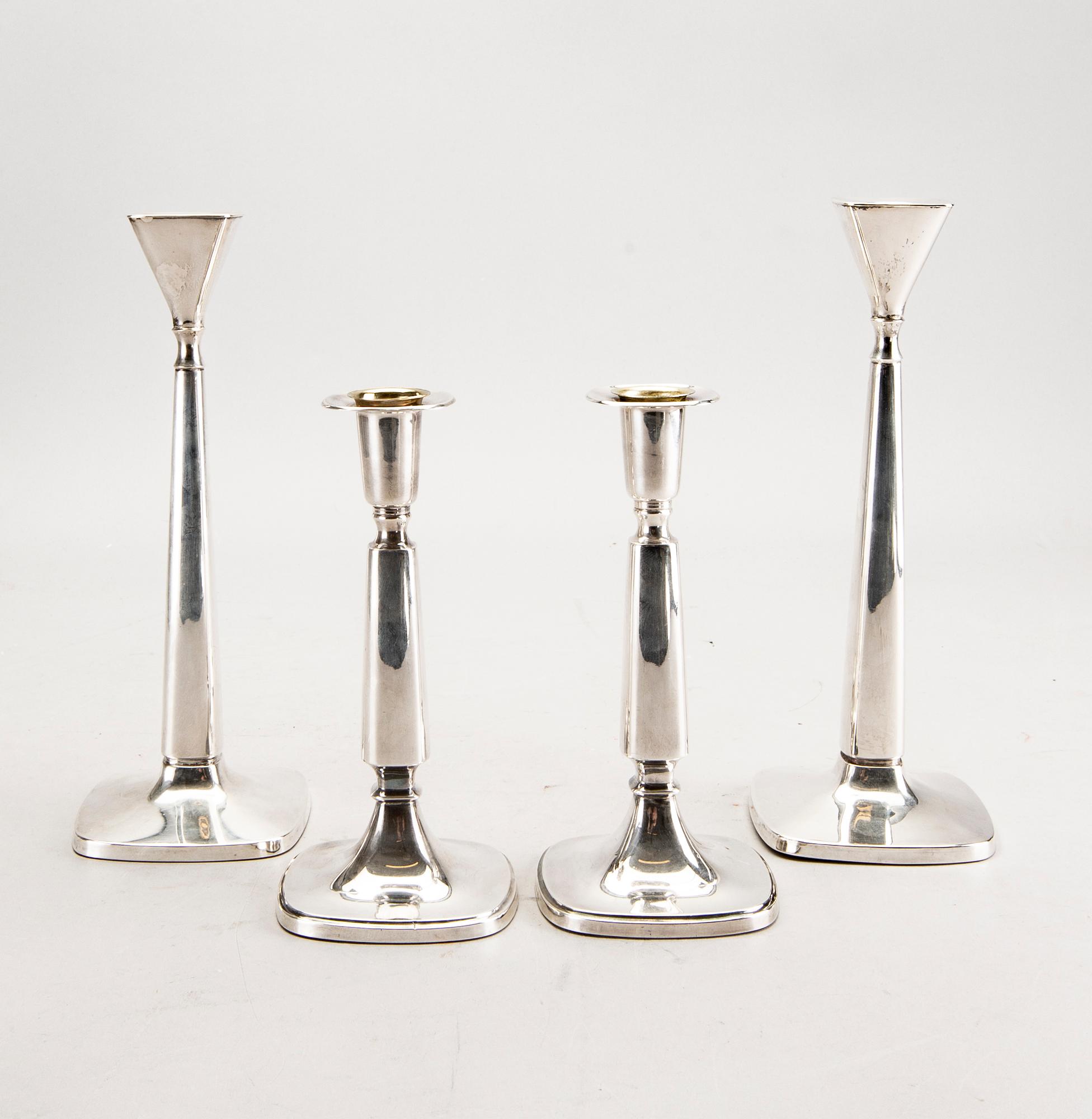A Swedish 20th century set of two pairs of candlesticks mark of T Eldh Göteborg 1968-70.