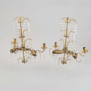 A pair of brass wall sconces, first half of the 20th century.