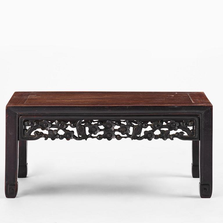 A Chinese hardwood kang table, late Qing dynasty.