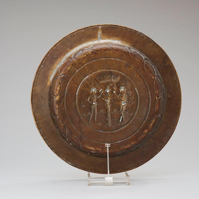 A brass alms dish, Southern Germany, 16th century.