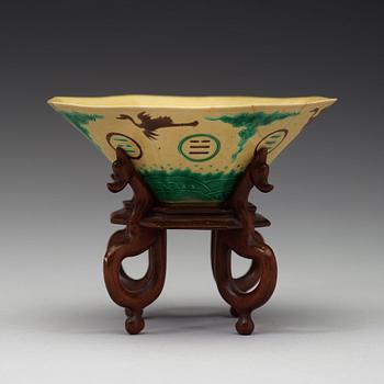 A yellow, green and aubergine glazed bisquit bowl, Qing dynasty, 18th Century.