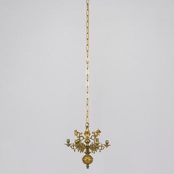 A brass candelabrum, first half of the 20th century.