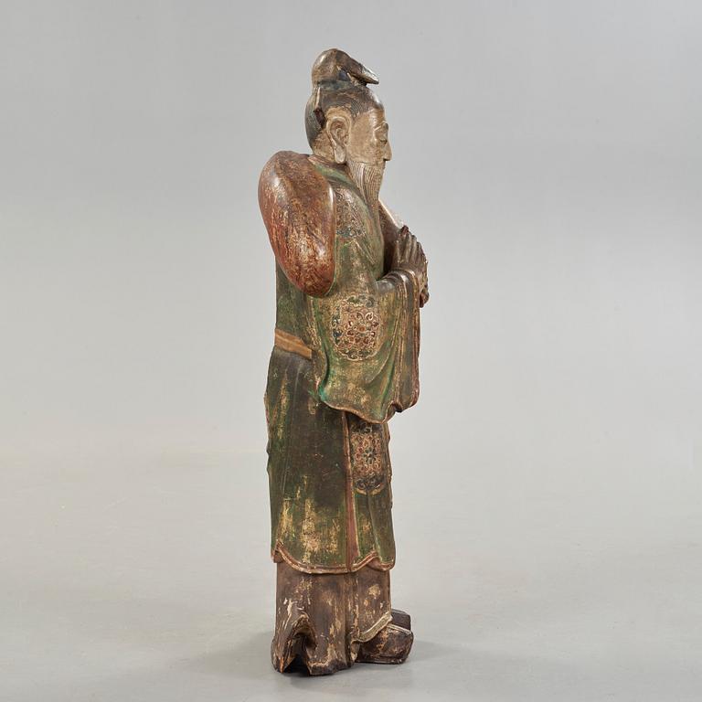 A large wooden scultpure of a daoist dignitary, 17/18th Century.