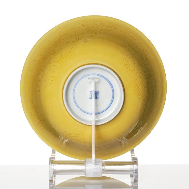A yellow glazed 'prunus' bowl, Qing dynasty, 18th century.