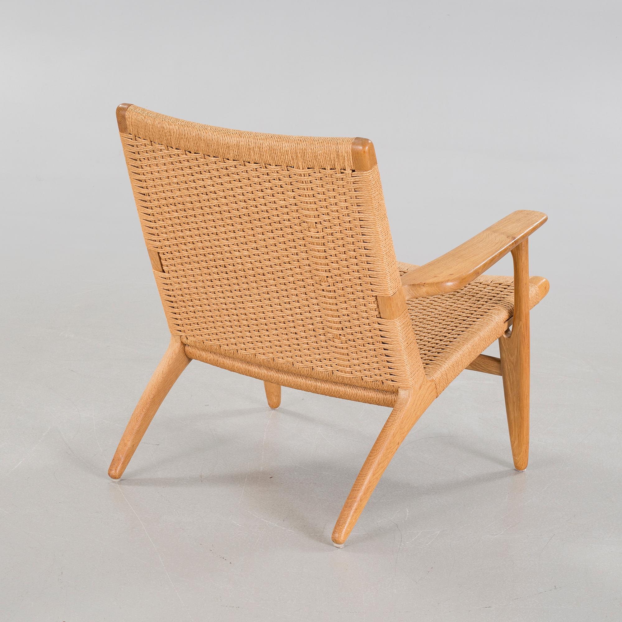 A lounge chair by Hans J Wegner, model "CH-25", for Carl Hansen & Son, Denmark, second half of the 20th century.