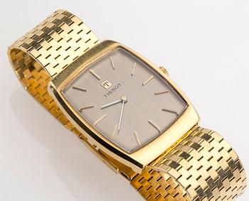 ARMBANDSUR, herr, Tissot, 18K guld. 1970-talets senare del. Vikt totalt ca 71 gram.