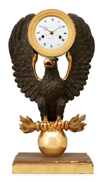 A Swedish Empire mantel clock, by E. Engelbrechten.