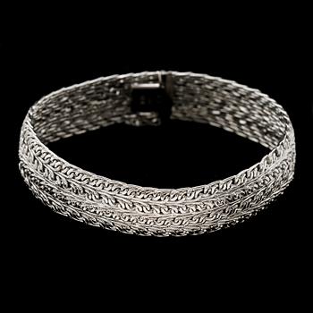 ARMBAND, 18k vitguld, Uno A Erre, Italien, 1900-talets senare hälft. Vikt 30 g.