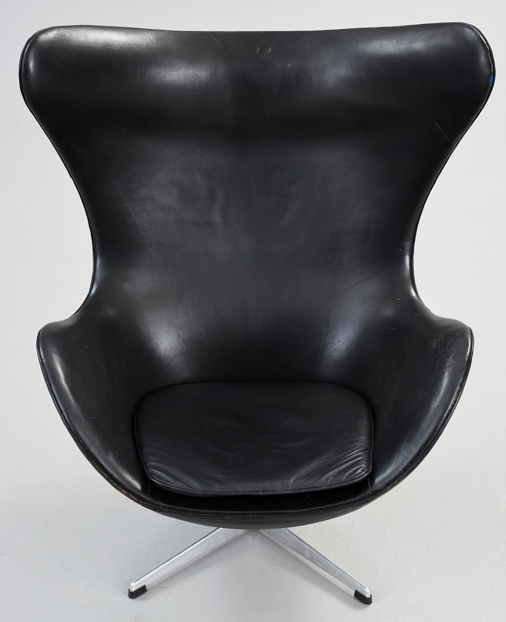 An Arne Jacobsen black leather 'Egg Chair', Fritz Hansen, Denmark 1964.