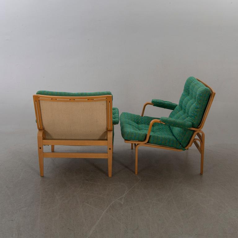 BRUNO MATHSSON, a pair  of easy chairs "Ingrid" for DUX.