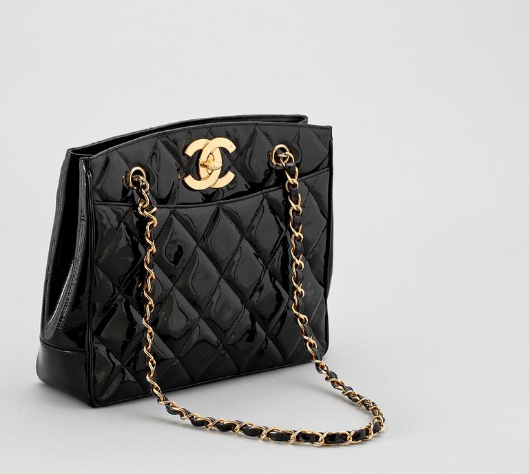 A 1980s black quilt leather shoulder bag by Chanel.