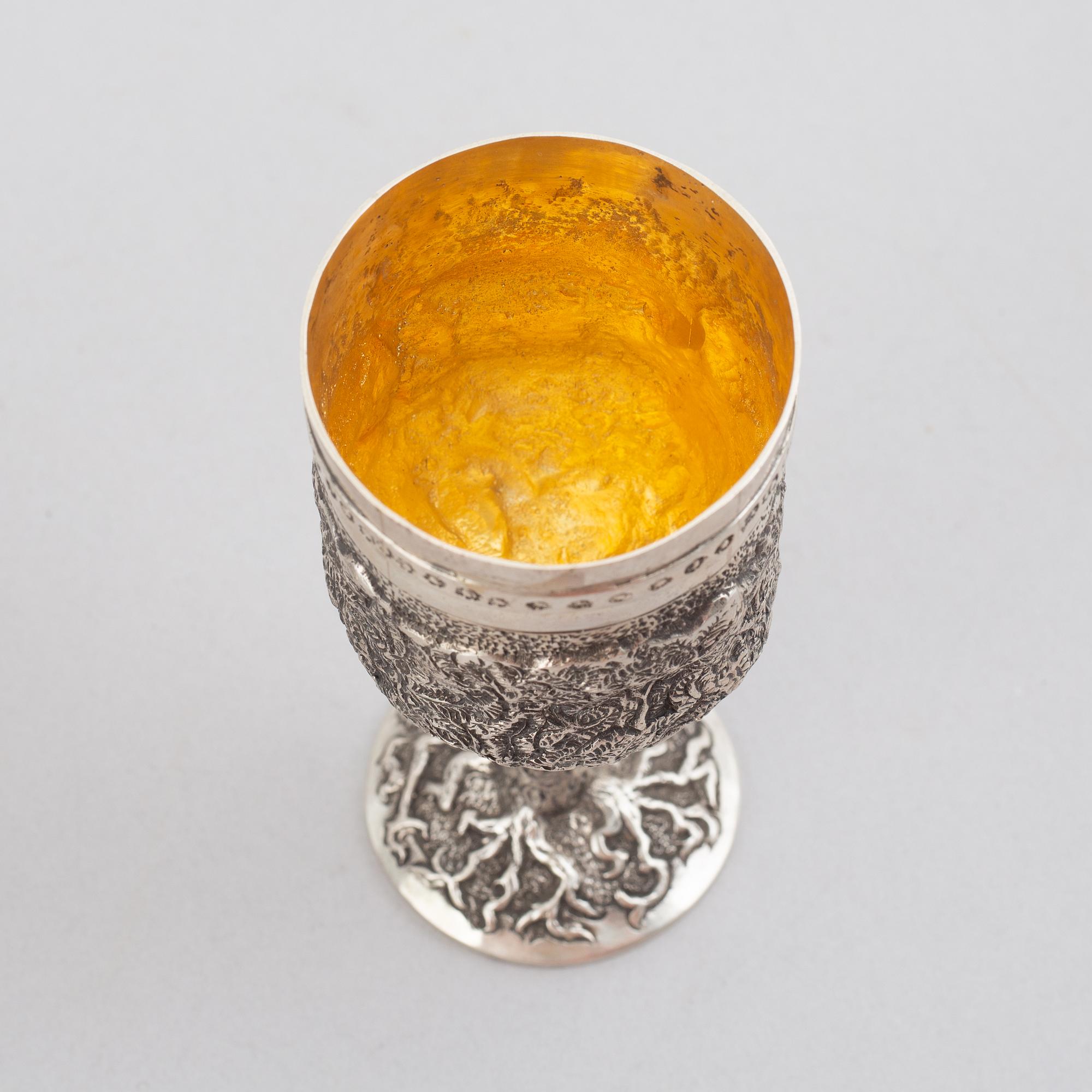 E.Jäntti, four silver cups, a three-piece silver coffee service and a silver tray, Helsinki, Finland,1979-81.