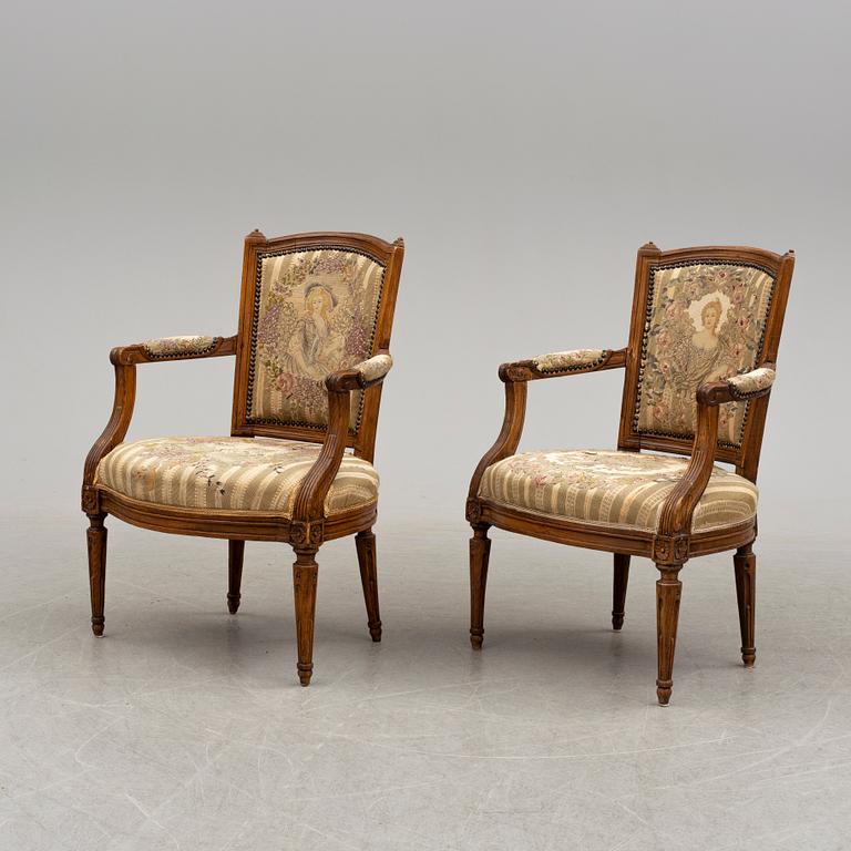 A pair of 18th/19th century armchairs.