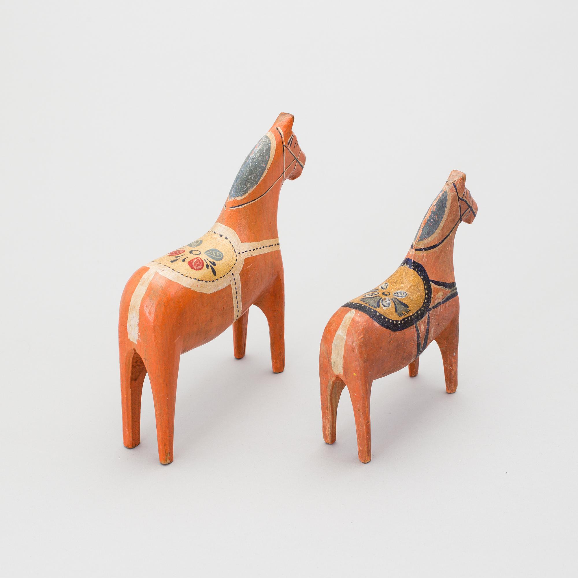 Two painted folk art dala horses first half of the 20th century.