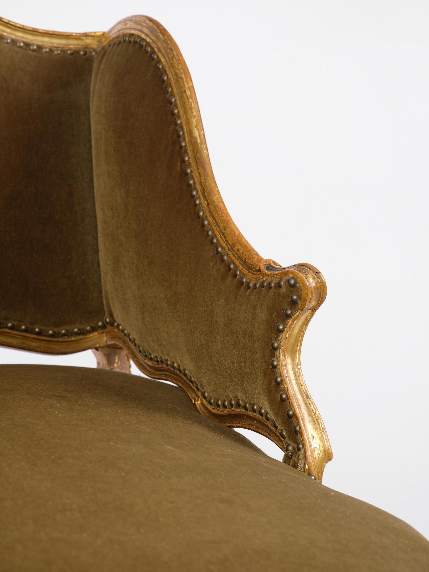 A French Louis Xv giltwood lit de repos, later part 18th century.