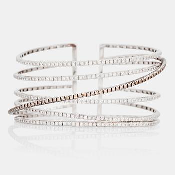 758. A brown and colourless brilliant-cut diamond bangle by Staurino Fratelli.