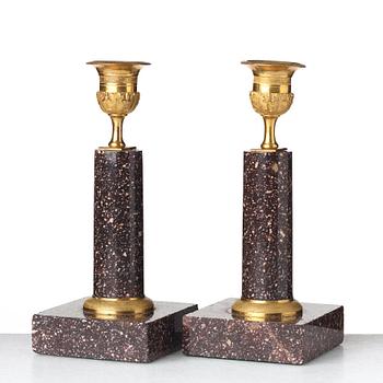 A pair of Swedish Empire candlesticks, early 19th century.