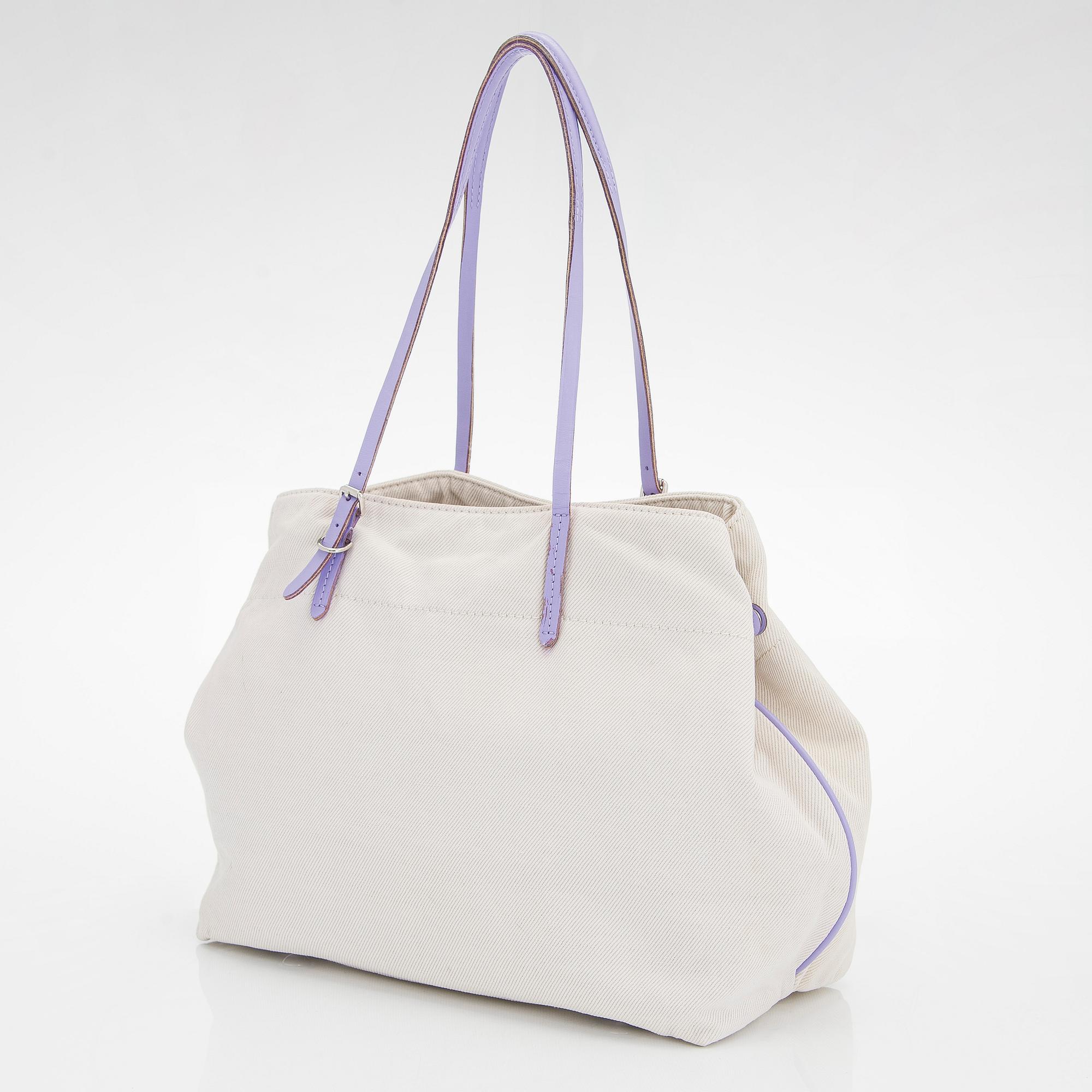 Louis Vuitton, a 'Cotton Canvas Articles De Voyage Cabas GM' bag.