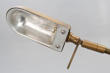 A pair of brass floor lamps 21 st century.