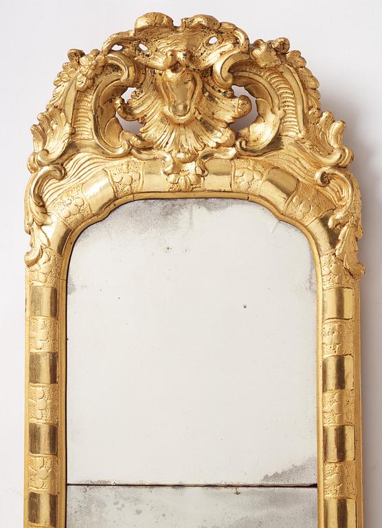 A rococo giltwood pier glass, Stockholm, later part 18th century.