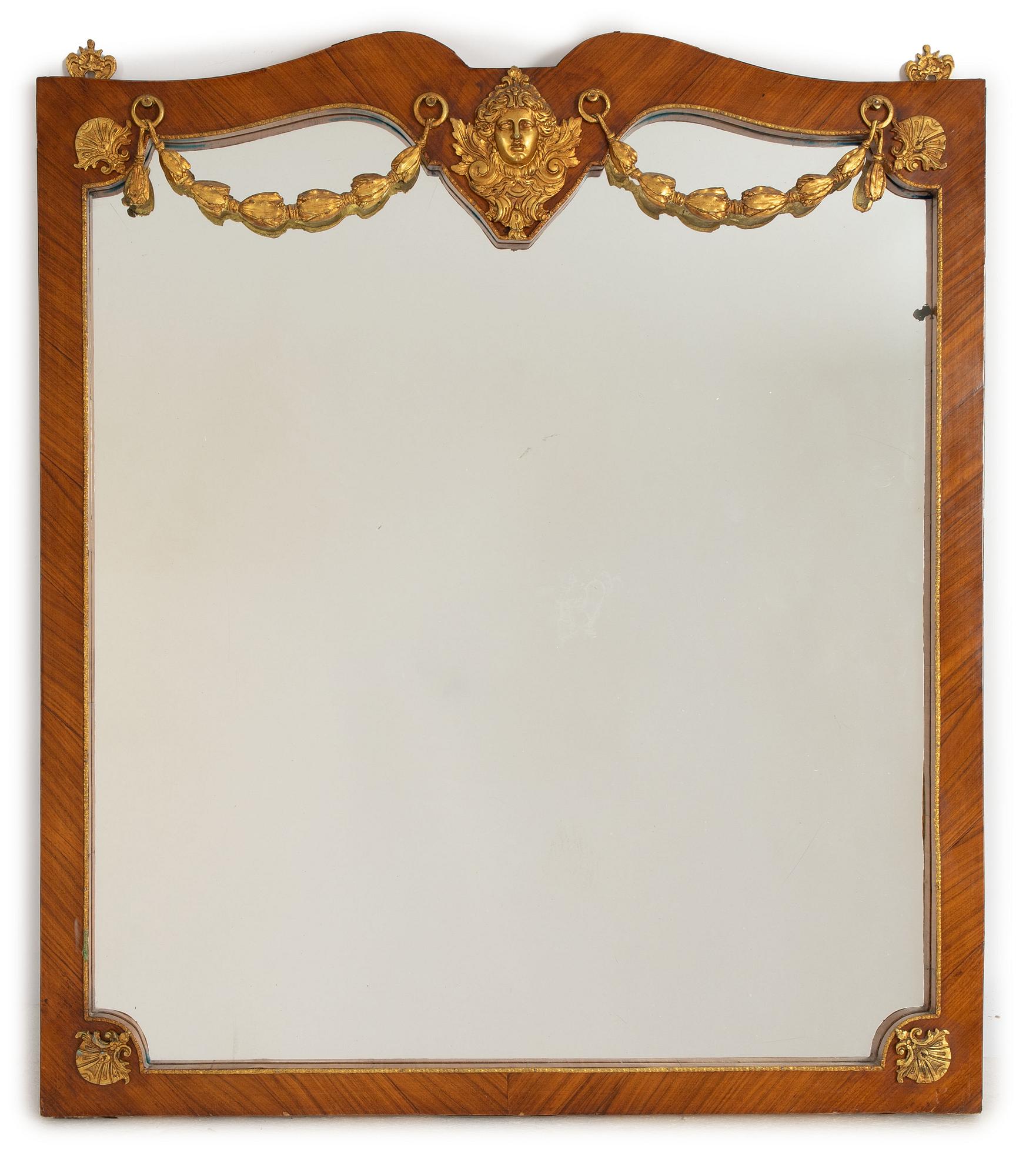 A Louis XIV-style gilt-brass mountd mirror, circa 1900.