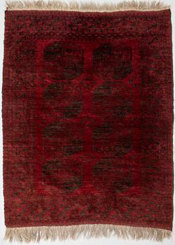 A semi-antique Afghan rug. Ca. 194x152 cm.