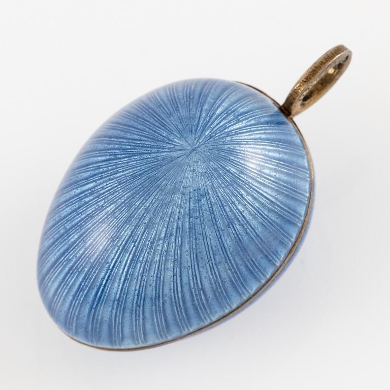 Pendant in the form of an egg, silver and enamel.
