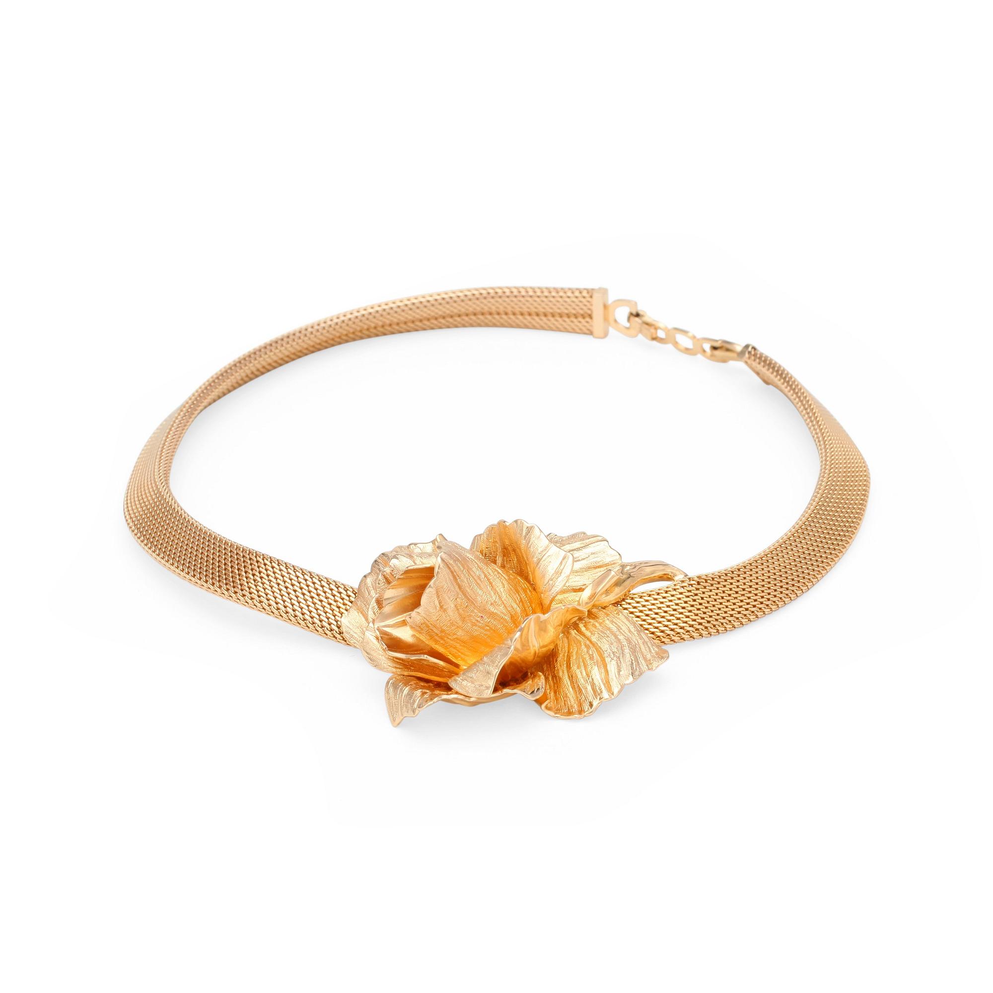 CHRISTIAN DIOR, a gold colored metal necklace.