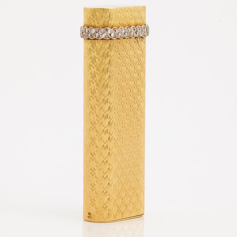 A cigarette lighter by Cartier set with single cut diamonds.