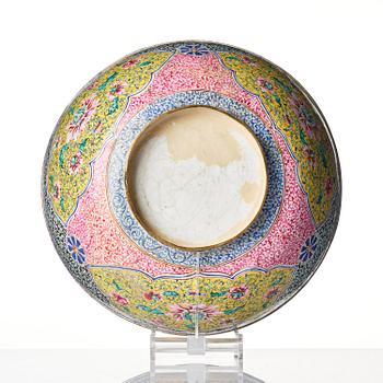 A large enamel on copper bowl, and a cover, Qing dynasty, 18th century.