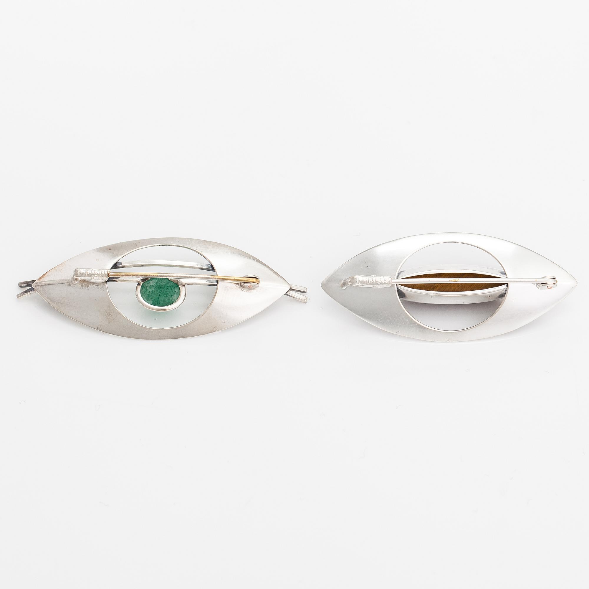 Elis Kauppi, Two silver broocher, with an aventurine quartz and tiger's eye. Kupittaan kulta, Turku 1959 and 1961.