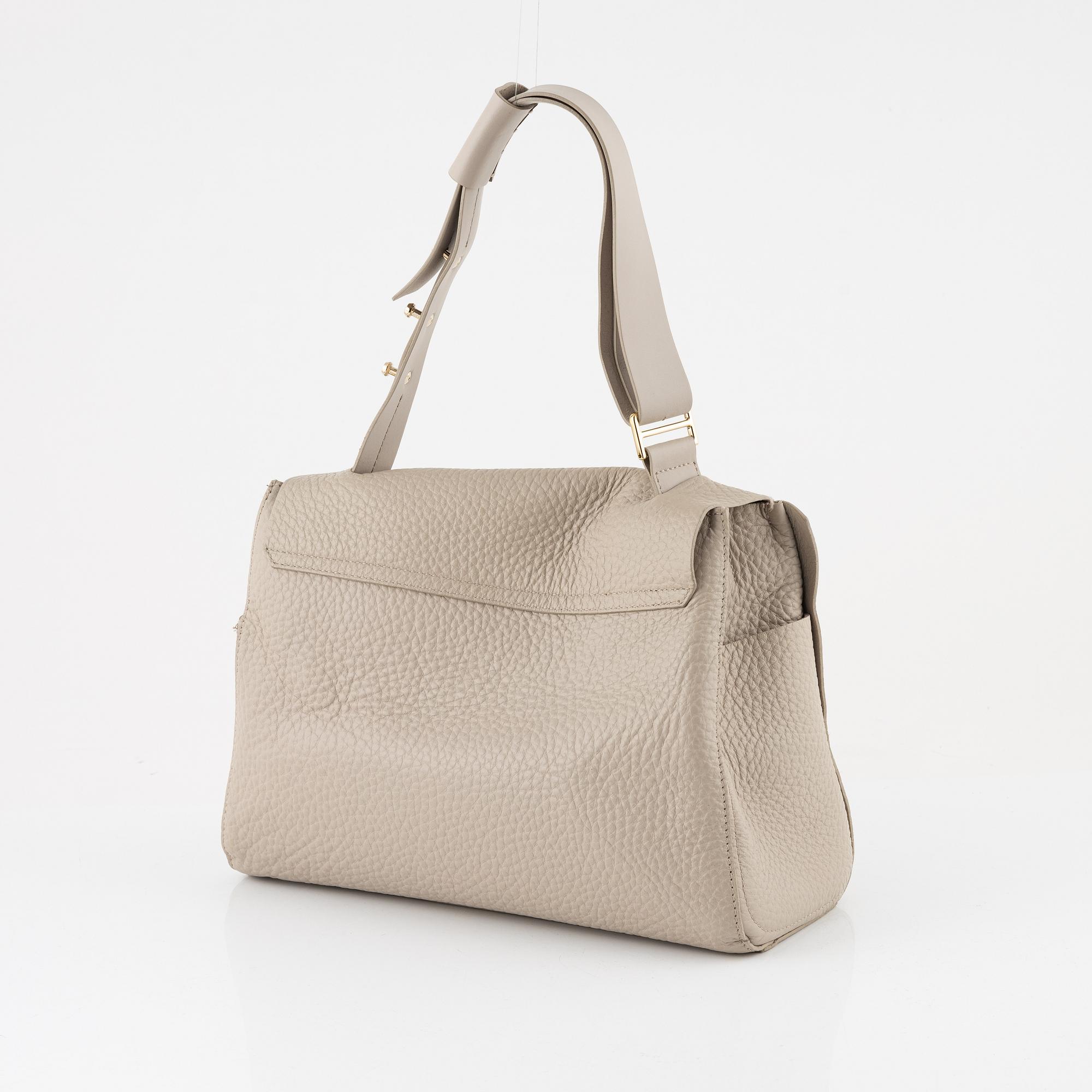 A Furla leather and suede handbag circa 2019. Bukowskis
