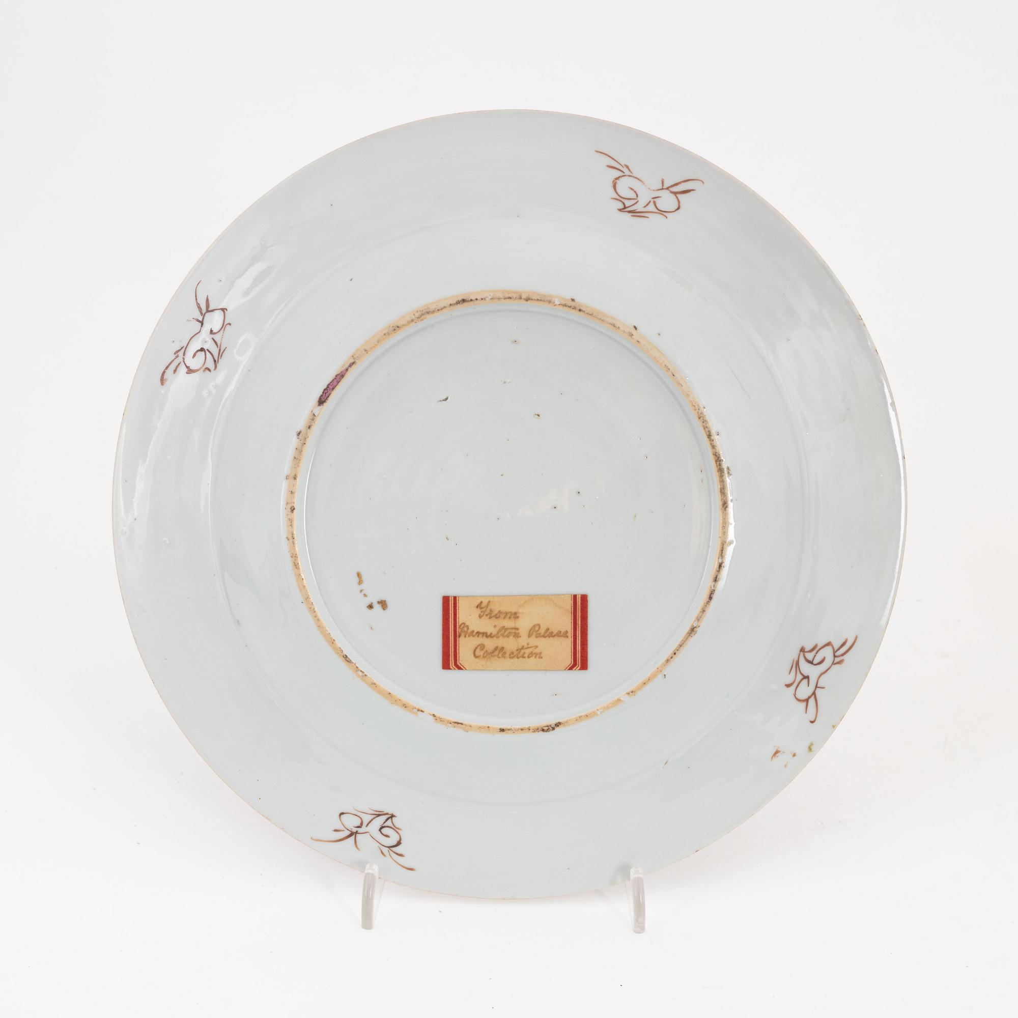 A pair of Chinese plates, a serving dish and a cream jug, Qing dynasty, 18th Century.