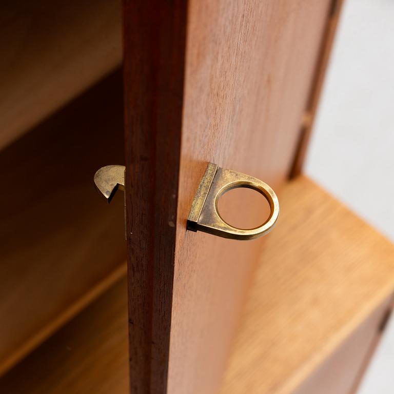 Hans J. Wegner, 2 cabinets and a shelf with a writing flap, Ry furniture, dated 1957.