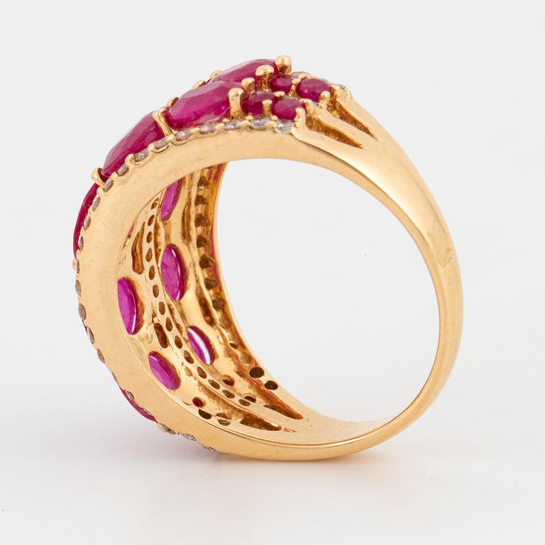 Oval shaped ruby and brilliant-cut diamond ring.