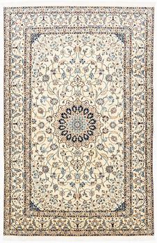 A carpet, Nain, part silk, fine 9 laa, signed, ca 327 x 210 cm.