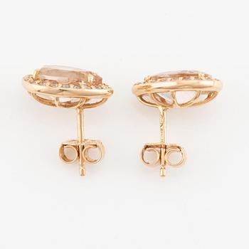 Pear shaped morganite and brilliant cut diamond earrings.