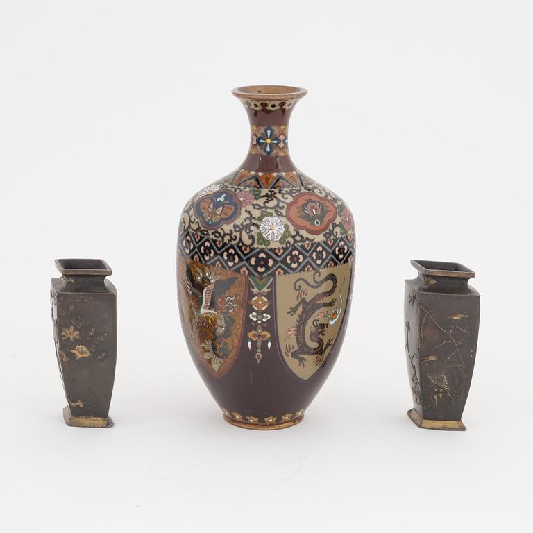 A pair of Japanese gilt bronze vases and a cloisonné vas, Meiji period (1868-1912).