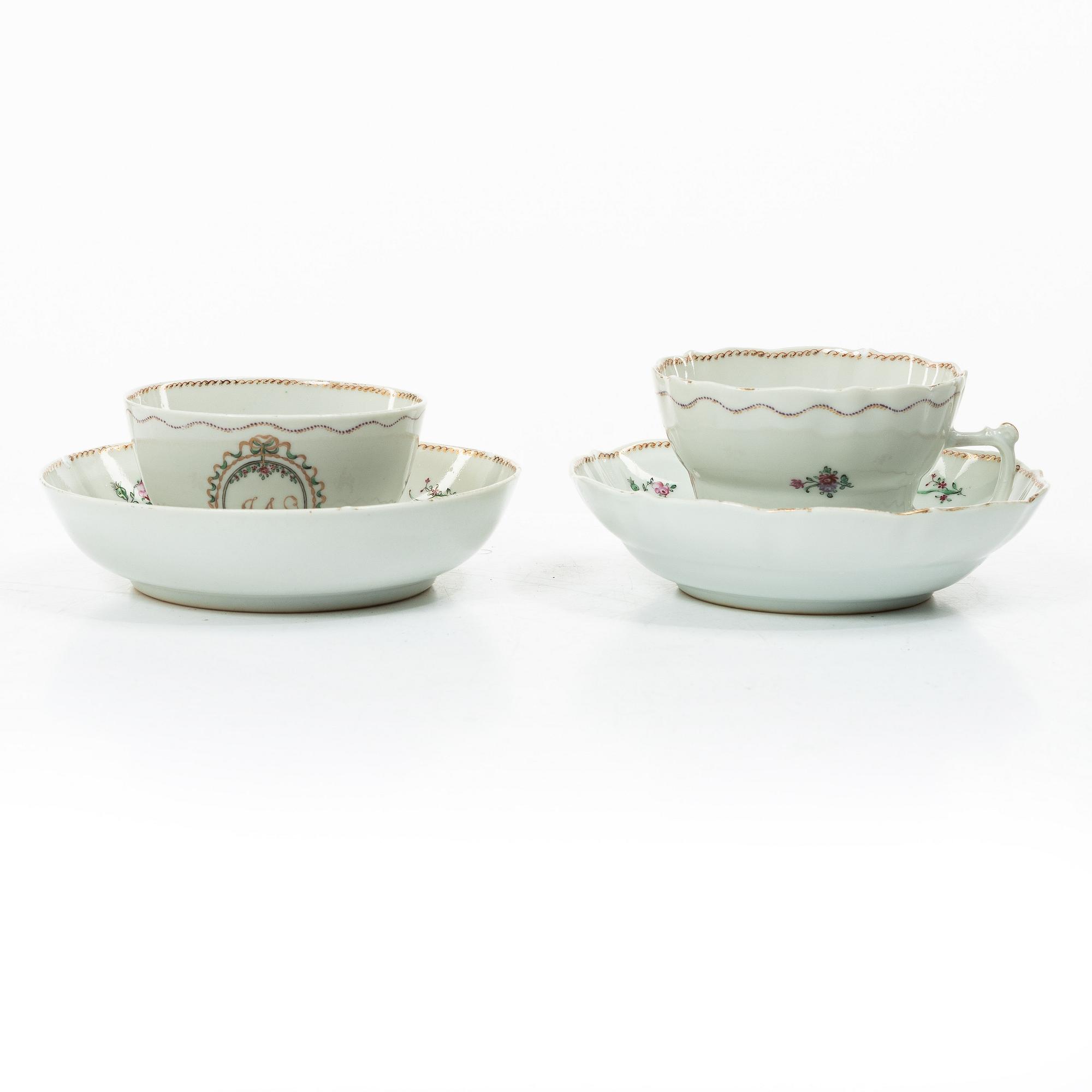 Cups and saucers, 11+7, and a teapot in famille rose with monogram, company porcelain, China, 18th century.