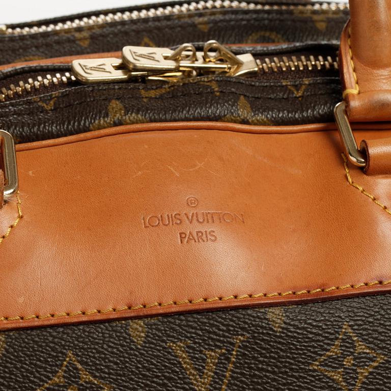 LOUIS VUITTON, a monogram canvas bag / garment cover.