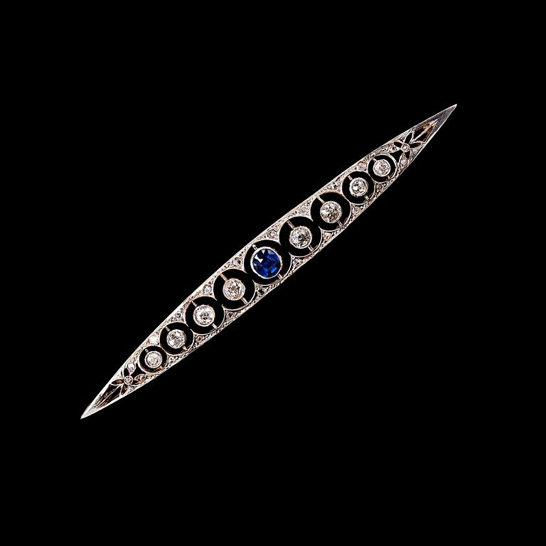 A BROOCH, old cut diamonds c. 1.10 ct, blue sapphire.