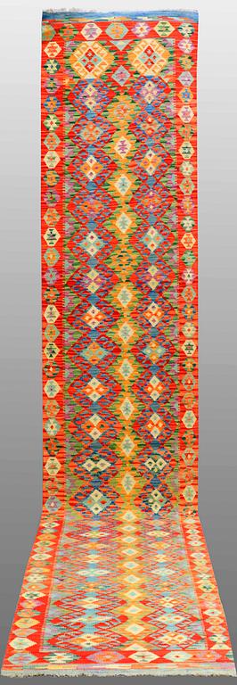 A Kilim carpet, ca 500 x 88 cm.