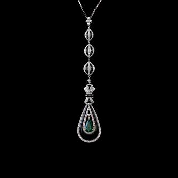 A PENDANT, Columbian emerald c. 1.46 ct, brilliant cut diamonds c. 1.20 ct, onyx. Weight 18 g.