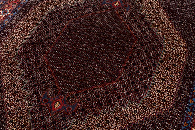 A Senneh carpet, c. 284 x 204 cm.