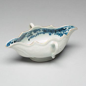 A blue and white armorial sauce boat, Qing dynasty, first half of the 18th Century.