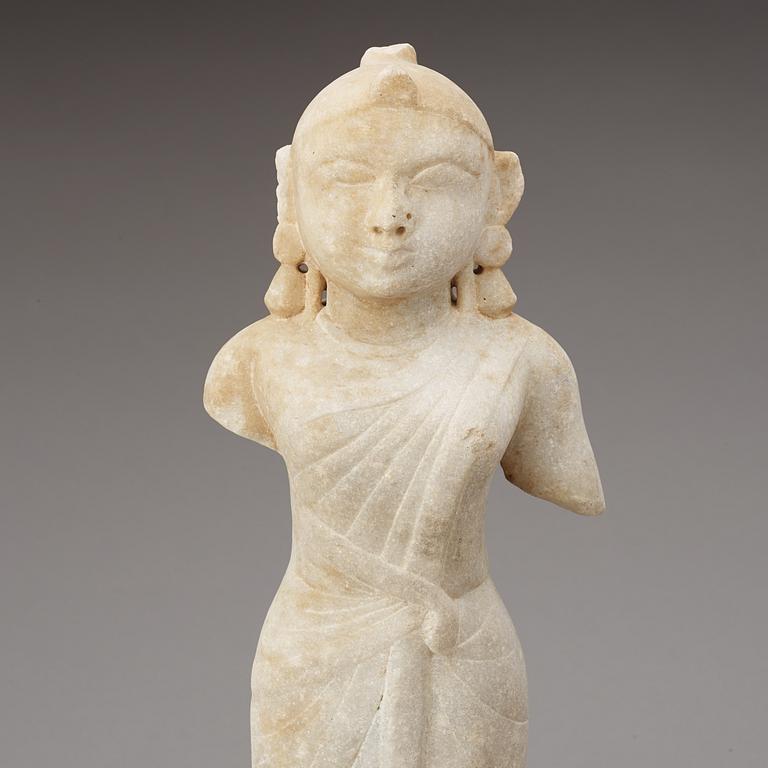 A Marble figure of a standing male figure, presumably Gujrat or Rajasthan, 17/18th Century.